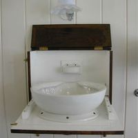 Fold-away Oak Campaign Basin Cabinet C.1900.
